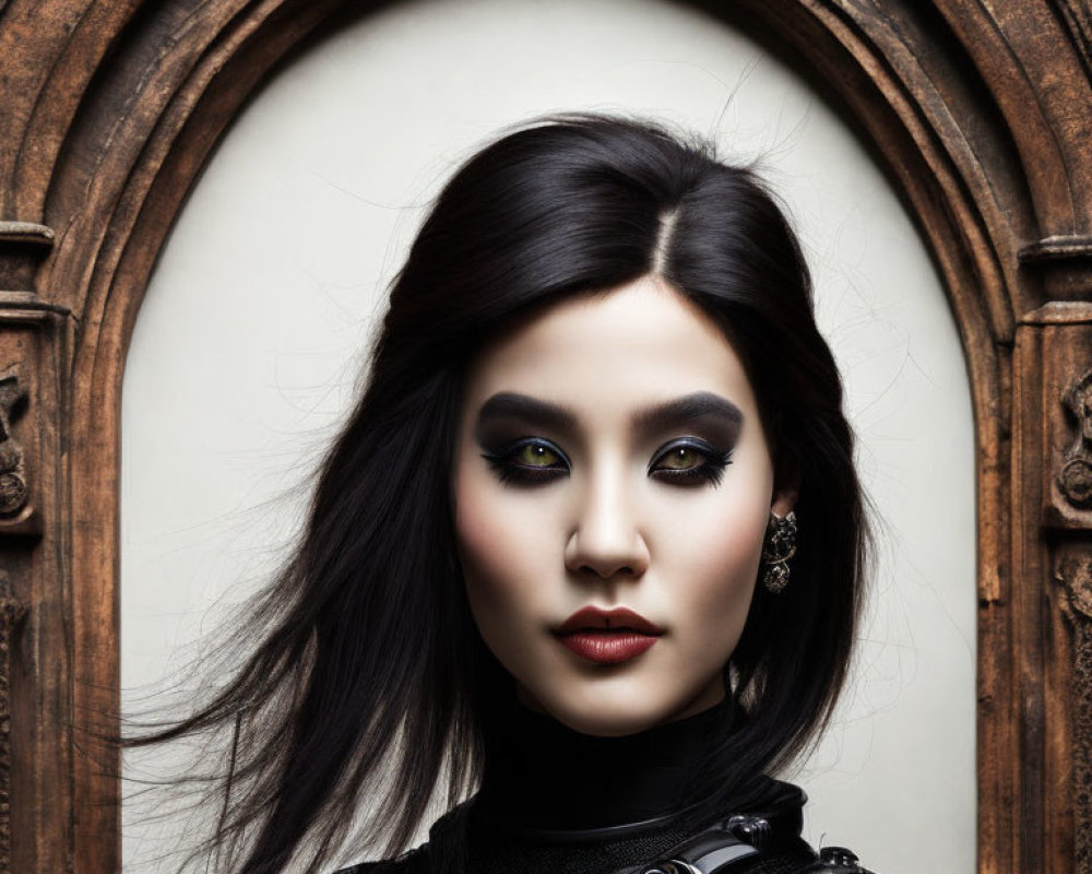 Portrait of Woman with Dark Hair and Striking Makeup in Gothic Arch Frame