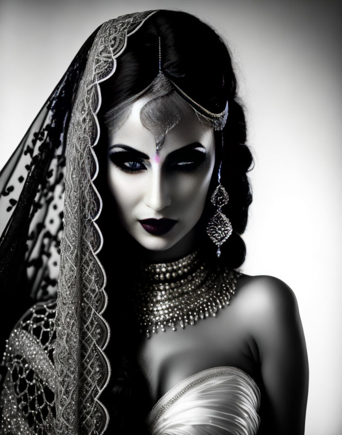 Monochrome portrait of a woman with traditional jewelry and makeup