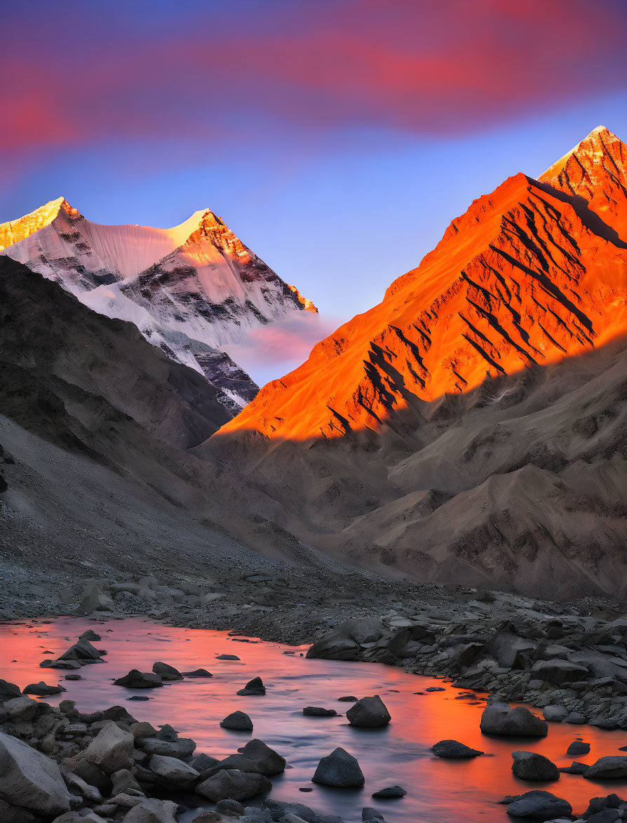 Mountain Peaks and Stream in Dusk Landscape