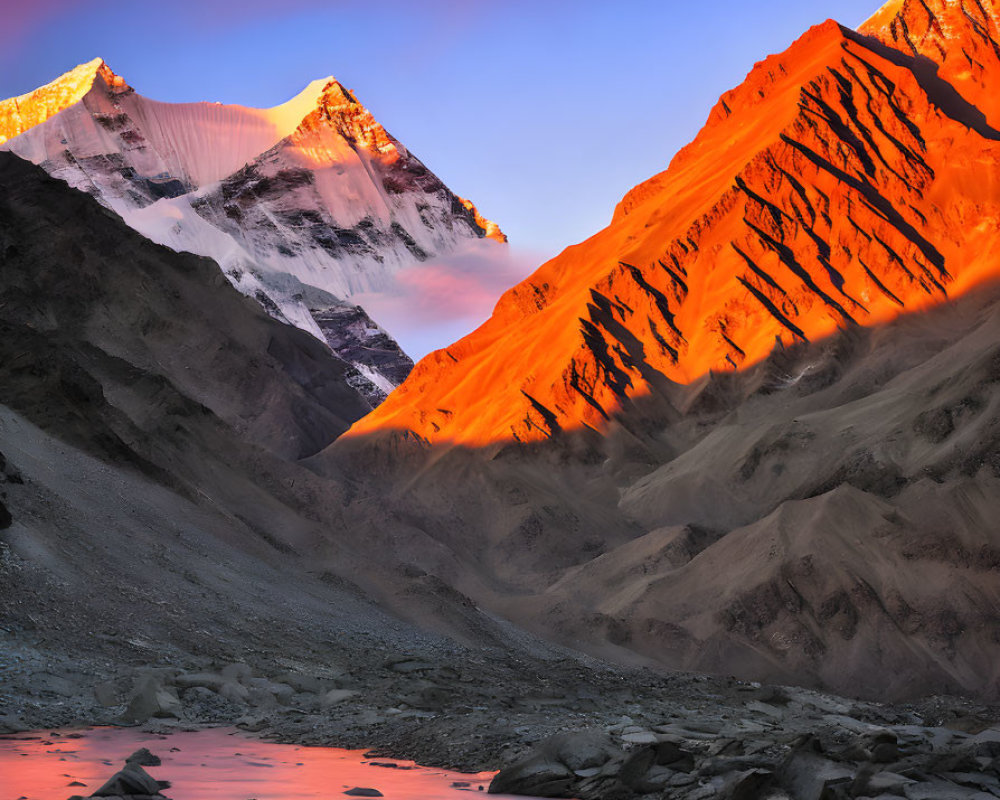 Mountain Peaks and Stream in Dusk Landscape