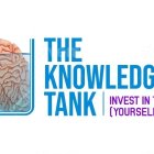 Blue rectangle logo with stylized brain & bold text "THE KNOWLEDGE TANK" & sub