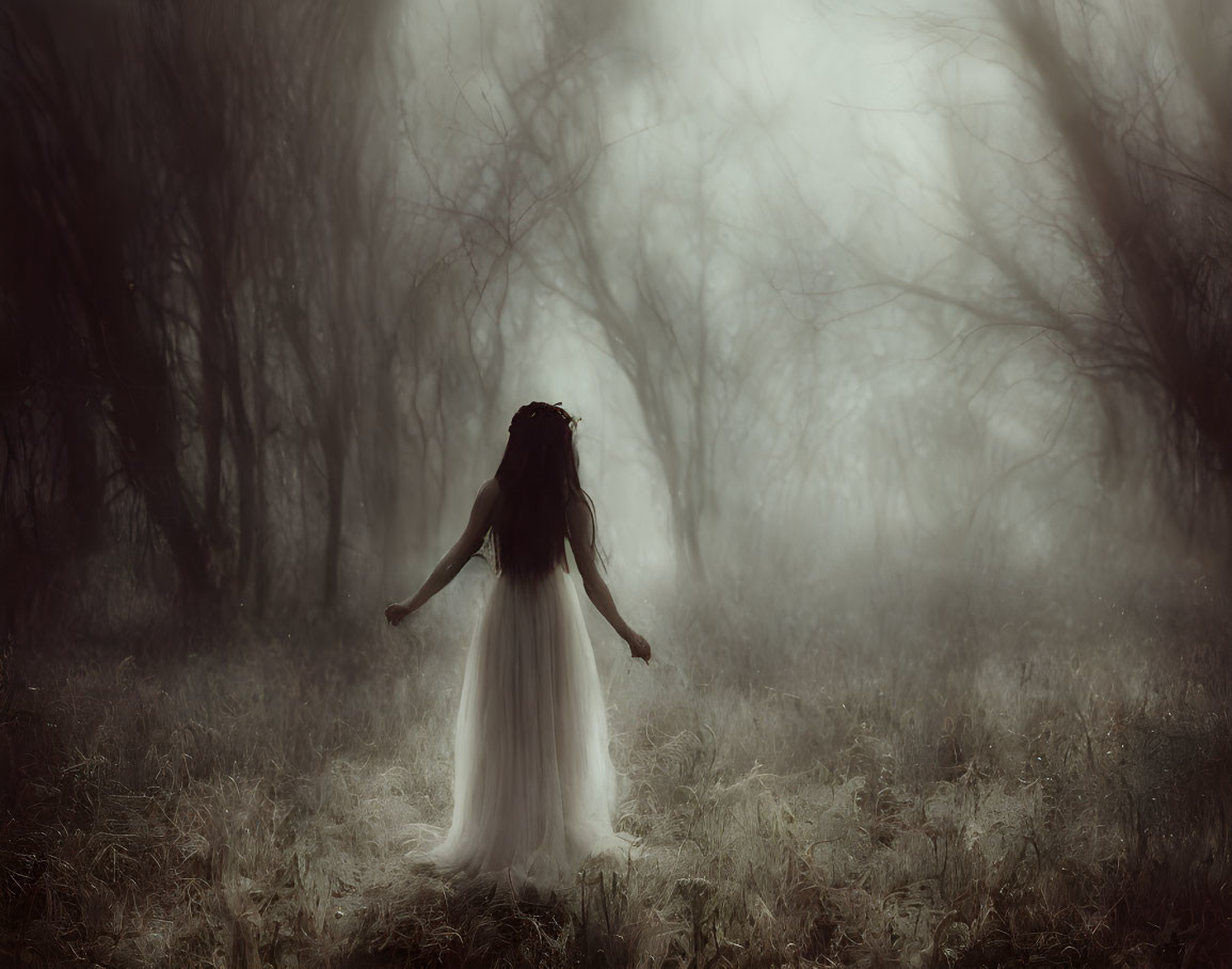 Woman in white dress in eerie, foggy forest evokes mystery