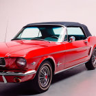 Vintage Red Ford Mustang Convertible with Black Top and Chrome Details