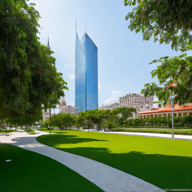 Glass skyscraper overlooking green park with trees