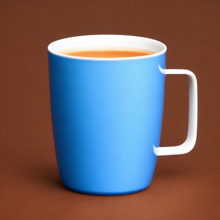 Blue Mug with Frothy Beverage on Brown Background