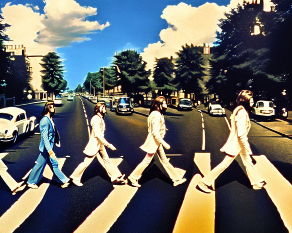 Four people crossing zebra crossing under sunny sky