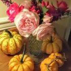 Orange Roses and Pumpkins on Teal Background with Gold Accents