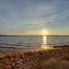 Colorful Sunset Painting with Calm Sea and Golden Reflections