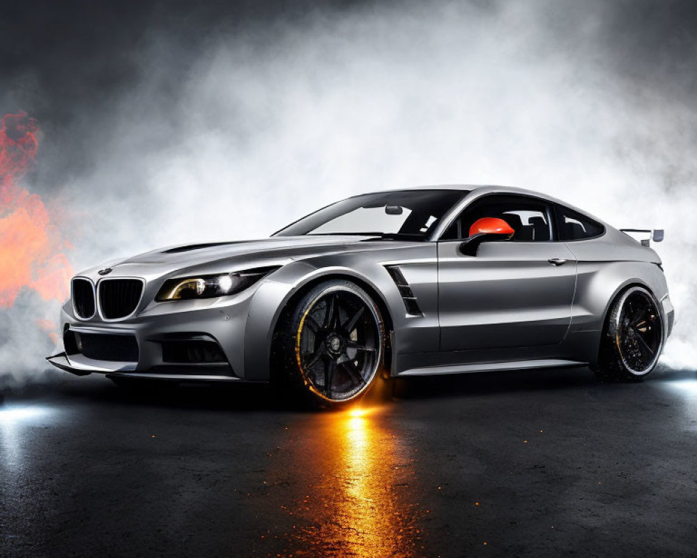 Custom Silver BMW Showcased with Dramatic Lighting and Orange Underglow