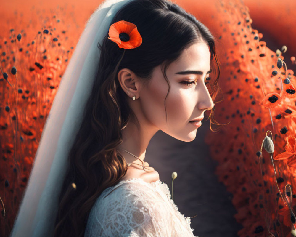 Woman in white dress with red flower in hair standing in poppy field portrait.