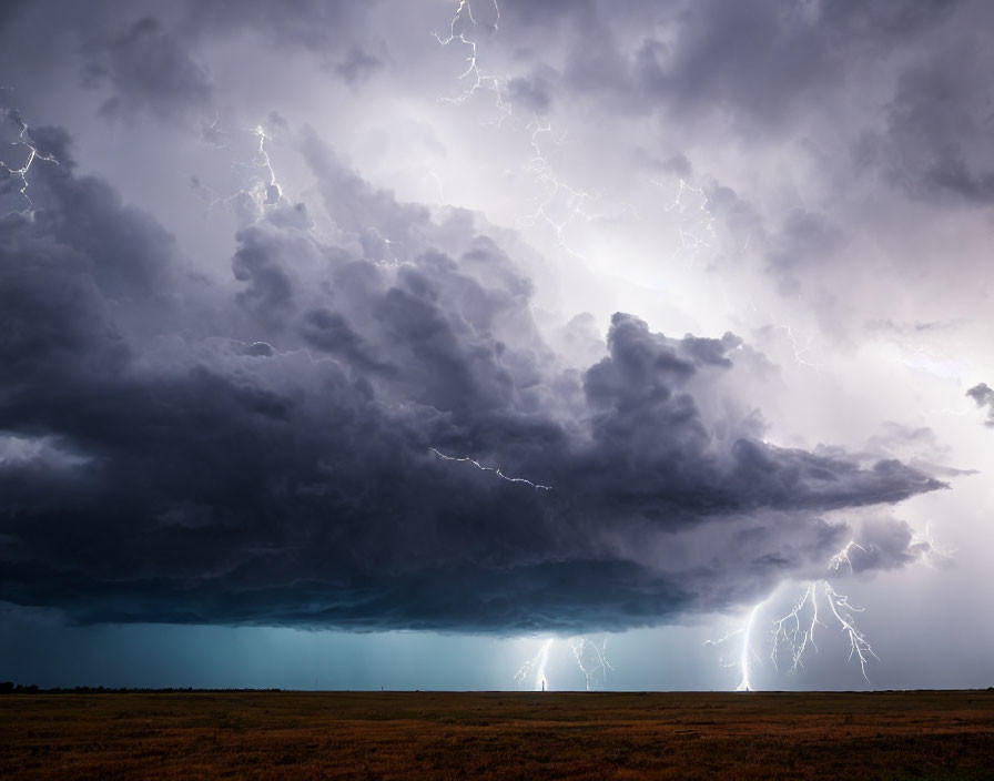 Intense thunderstorm with multiple lightning strikes under dark clouds