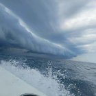 Stormy Ocean Scene with Crashing Waves and Lightning