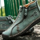 Rugged Outdoor Boots with Grey Exterior and Traction Sole