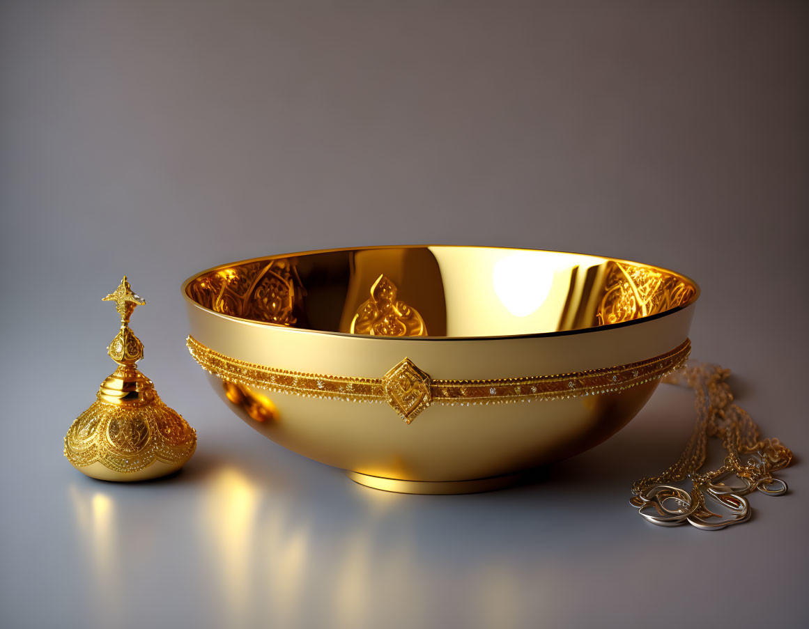 Golden Bowl, Perfume Bottle, and Chain with Reflective Surface on Grey Background