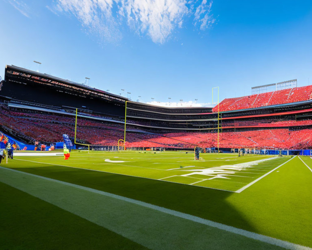 Sunlit Stadium with Lush Green Field and Spectators