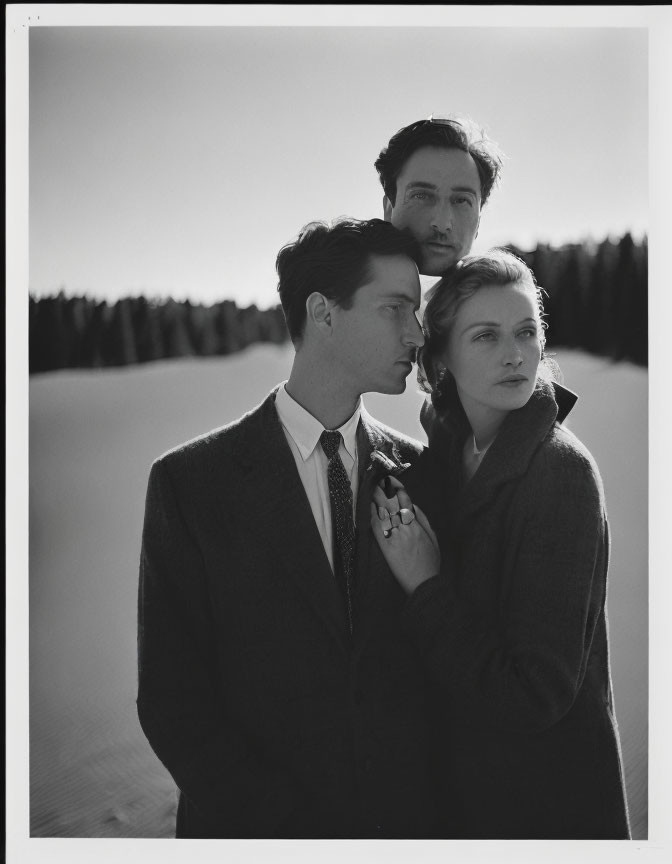 Vintage Clothing Trio in Snowy Landscape