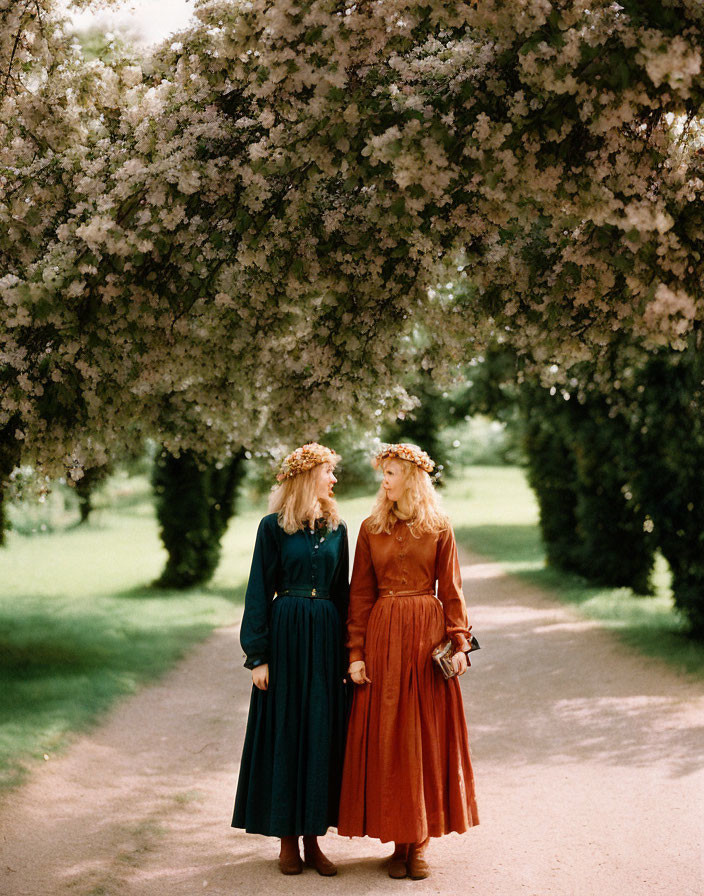 Vintage Dresses: Two Women in Blooming Garden