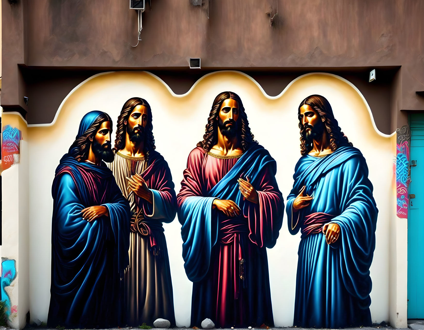 Vibrant mural featuring four Jesus Christ figures in various robes and poses