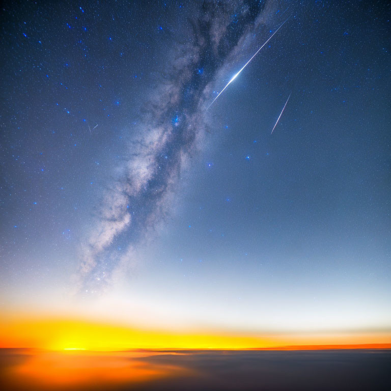 Colorful sunset horizon with starry sky featuring Milky Way and shooting stars