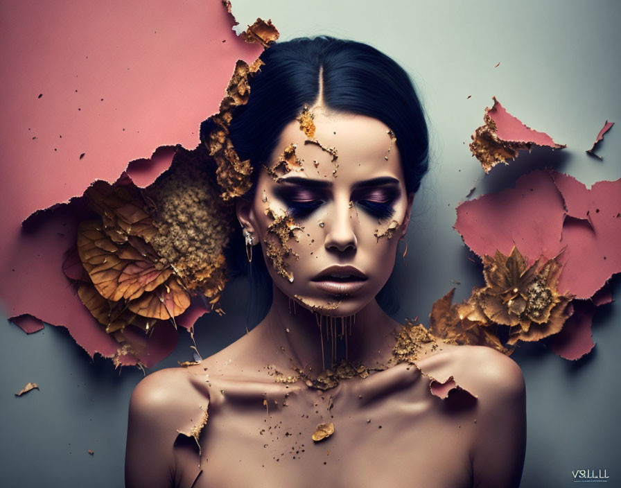 Woman with dramatic makeup amidst copper leaves symbolizing autumn.