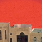 Curved white buildings under surreal red sky with stars