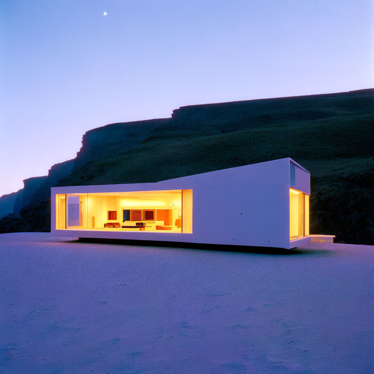 Contemporary minimalist house with large windows, glowing interior lights, twilight sky, rugged cliff.