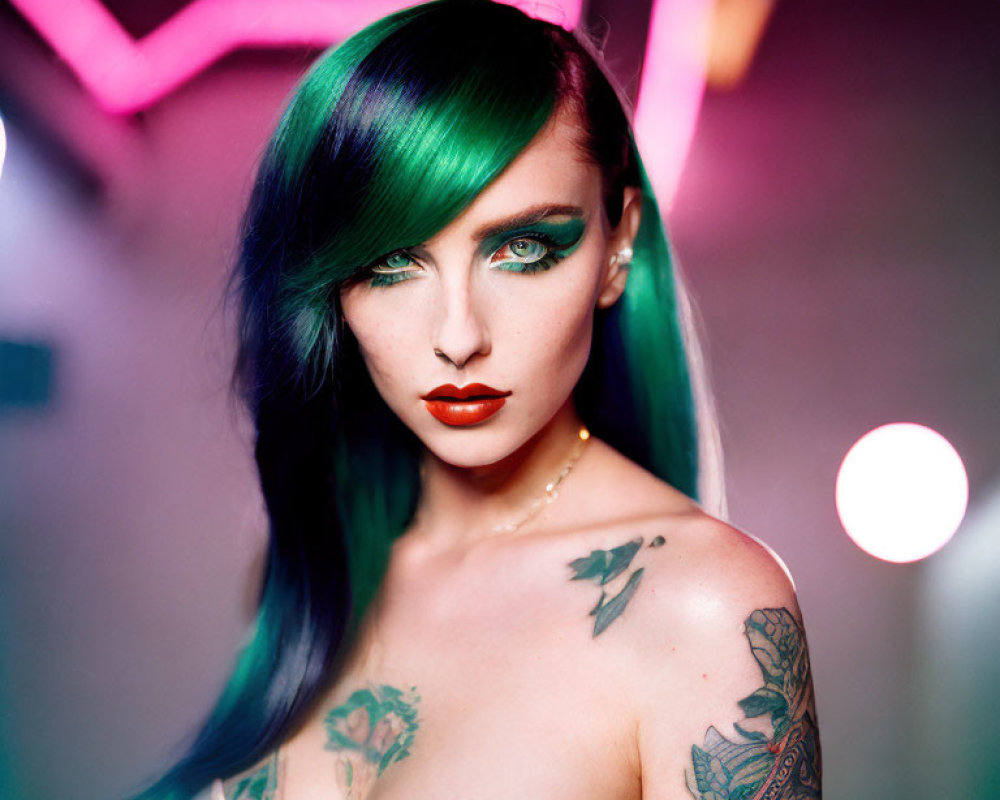 Woman with Green and Black Hair and Shoulder Tattoos in Neon-lit Setting