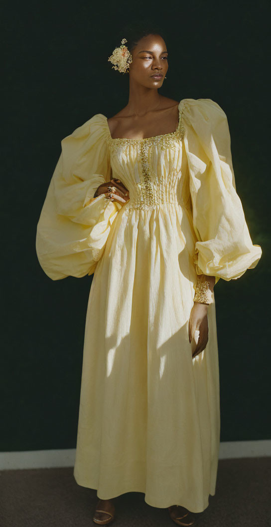 Woman in Yellow Dress with Puffed Sleeves and Floral Hairpiece