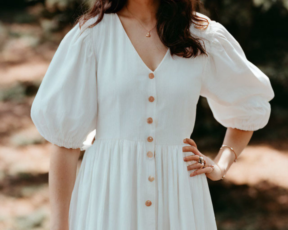 Woman in White Puffy-Sleeve Dress Outdoors