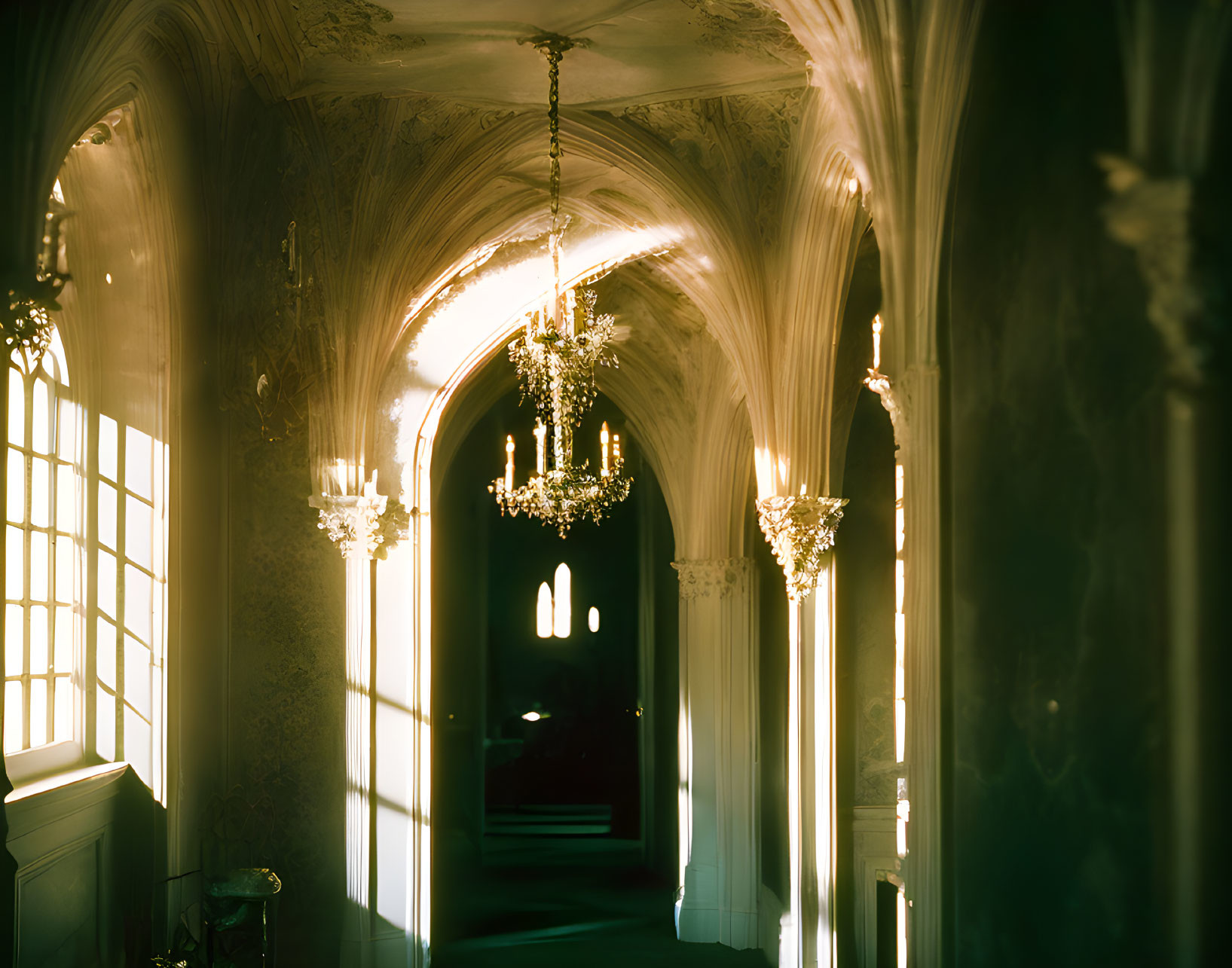 Vintage Chandeliers and Ornate Ceilings in Elegant Corridor