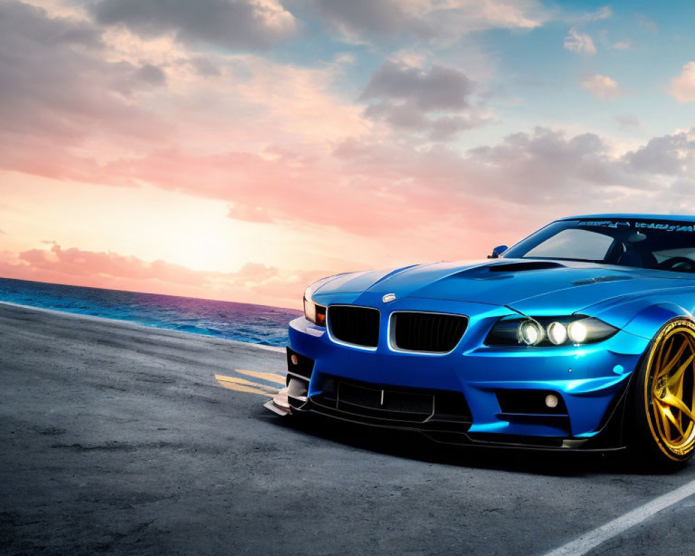 Blue sports car parked on coastal road at sunset with vivid sky