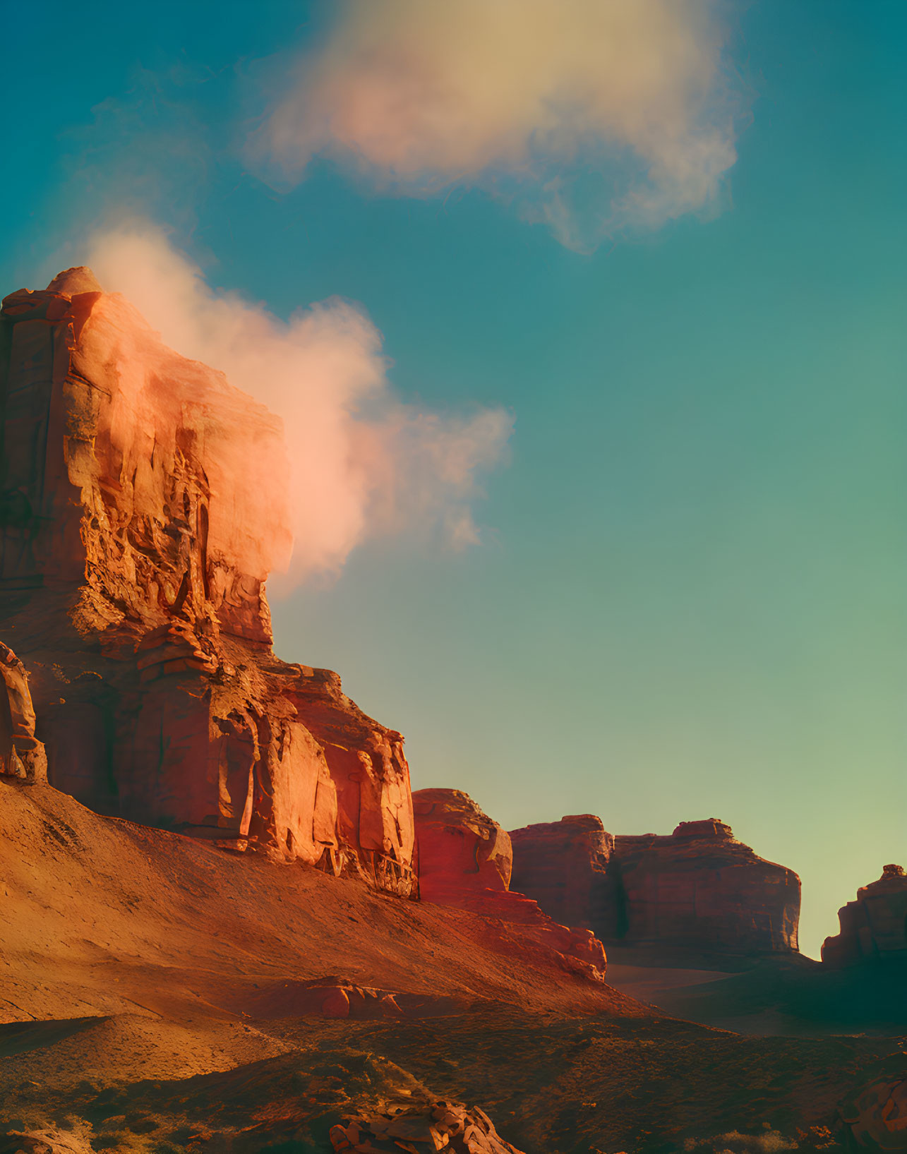 Majestic red sandstone rock formation under sunset sky