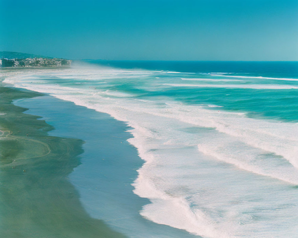 Coastline with Waves, Sandy Beach, Cityscape, Blue Sky