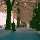 Woman in dress in fantasy landscape with giant trees and cherry blossoms at sunset