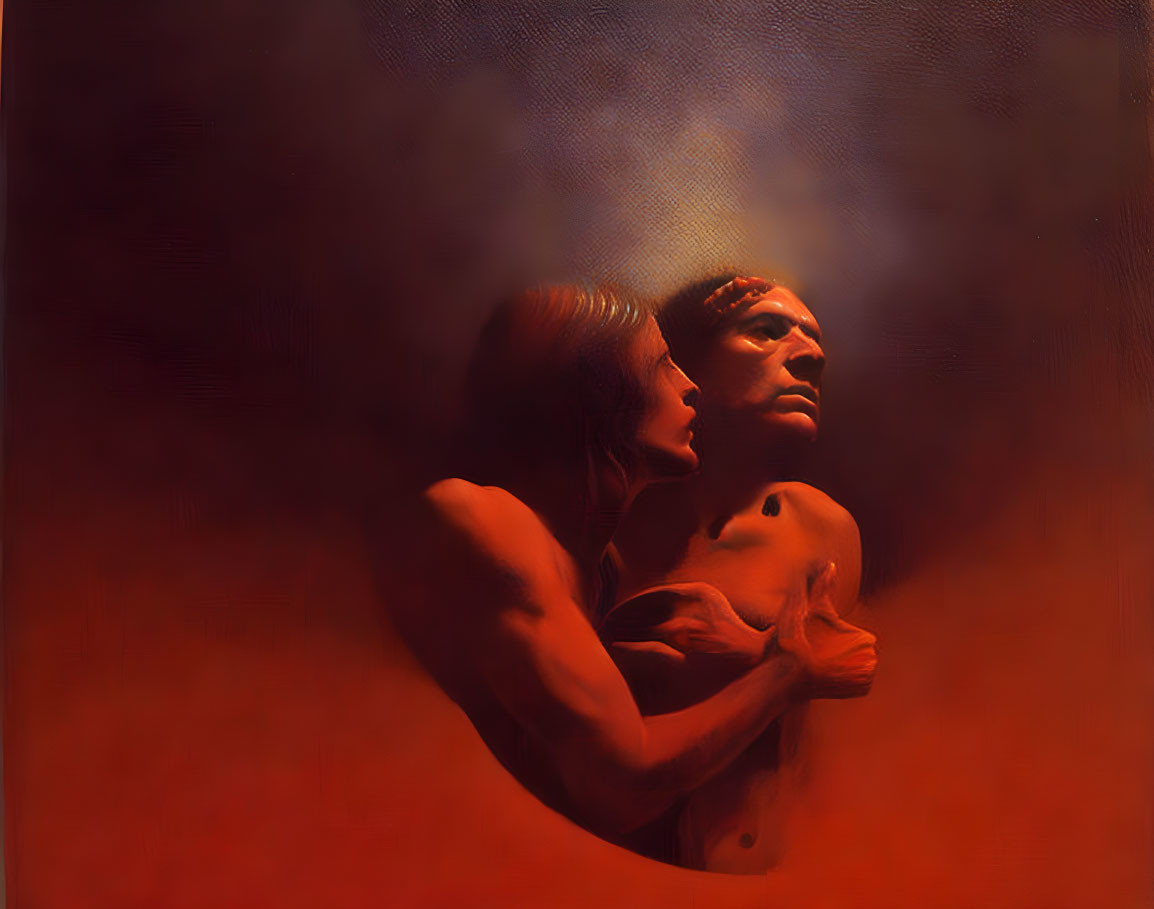 Shirtless man embracing woman in profile against warm, reddish backdrop