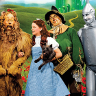 Classic characters on Yellow Brick Road with Emerald City.