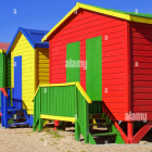 Colorful Beach Huts Under Clear Blue Sky and Vases by Red Hut