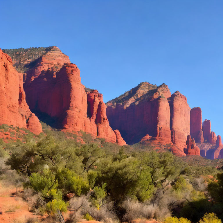 Majestic red rock formations under clear blue sky