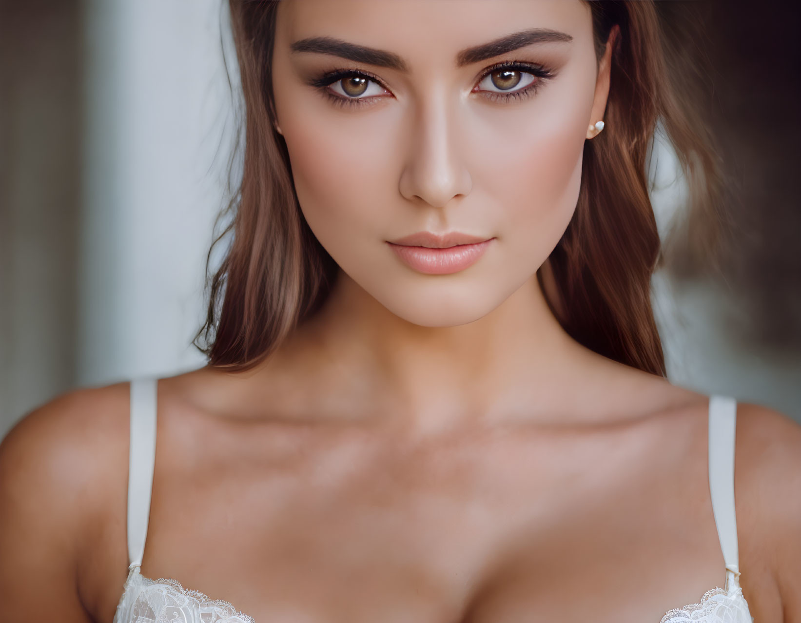 Portrait of woman with brown hair and lace garment, direct gaze