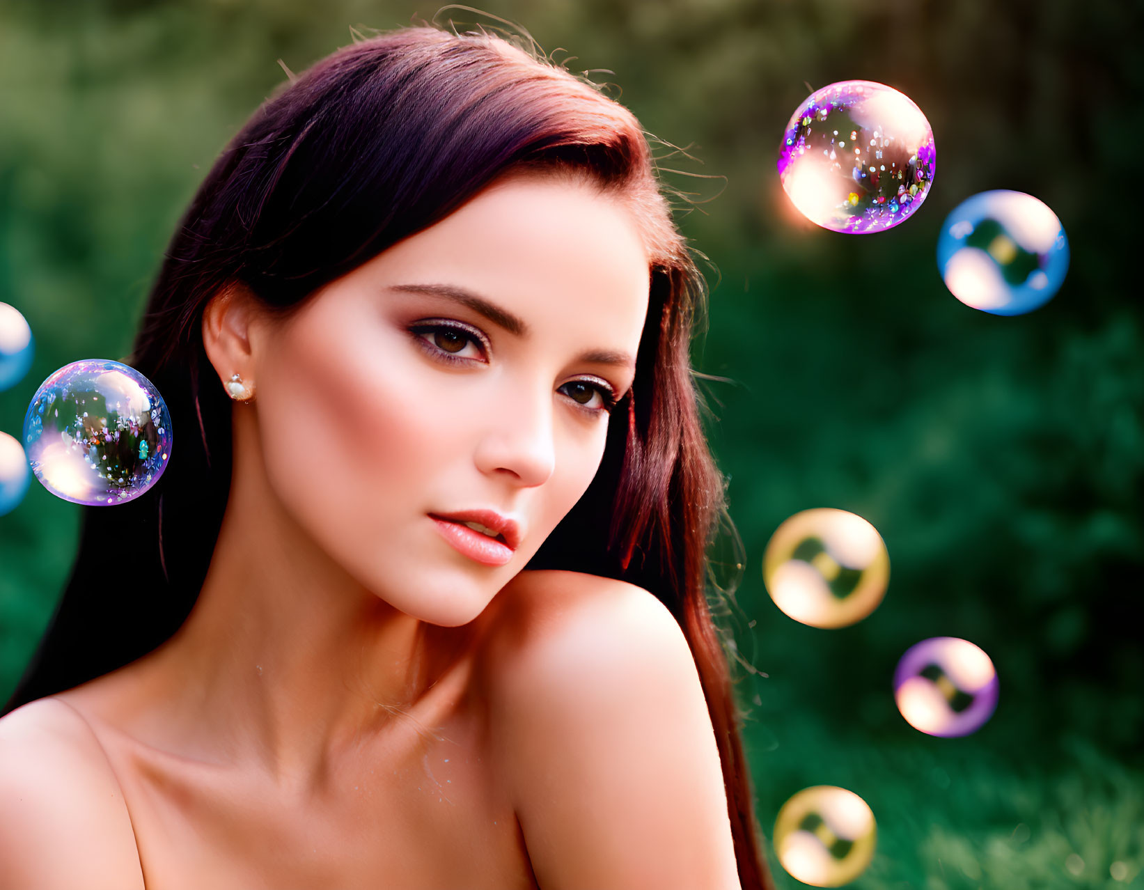 Dark-Haired Woman Surrounded by Iridescent Soap Bubbles on Green Background