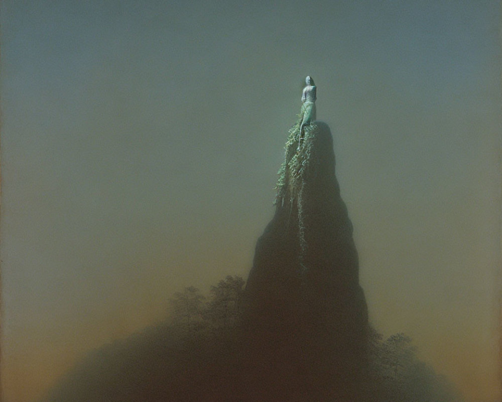 Person standing on steep rock formation in misty ambiance with cascading foliage