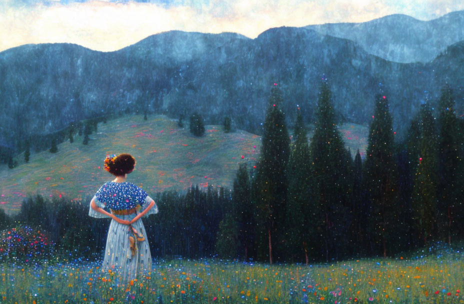 Woman in White Dress Standing in Blooming Meadow with Misty Mountains View