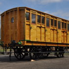 Stylized oversized steam locomotive in desert scenery