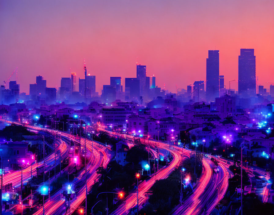 City skyline at dusk with vibrant illuminated streets and buildings