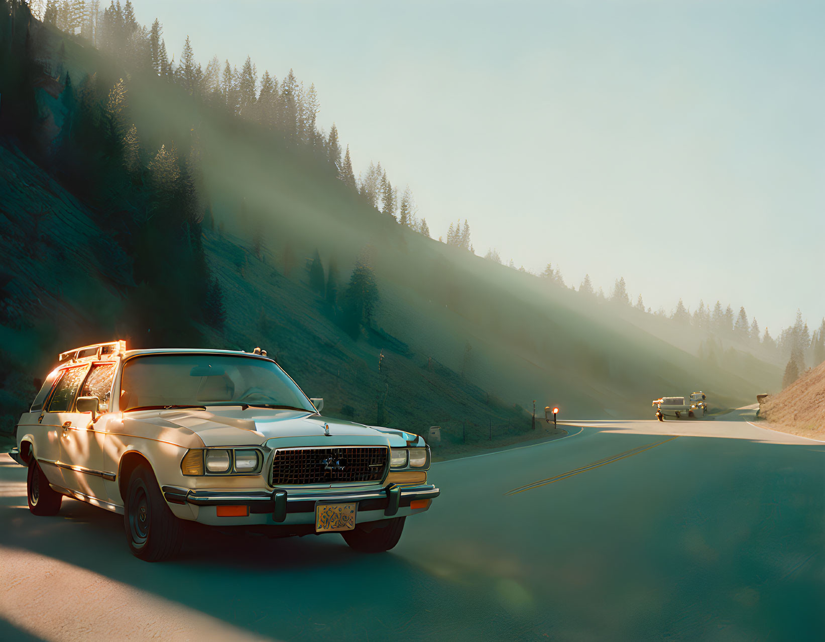 Vintage Car Driving on Sunlit Mountain Road with Fog and Pine Trees