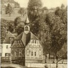 Sepia-Toned Sketch of Quaint Village with Half-Timbered Building