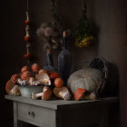 Vintage Mushroom Arrangement on Antique Table with Teapot and Lanterns