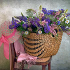 Colorful Flower Basket Painting Surrounded by Greenery