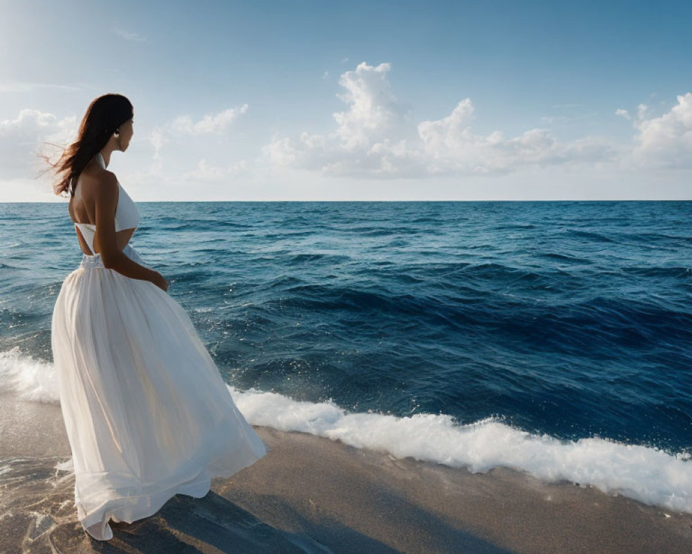 Woman in White Dress on Beach Looking at Sea Under Blue Sky