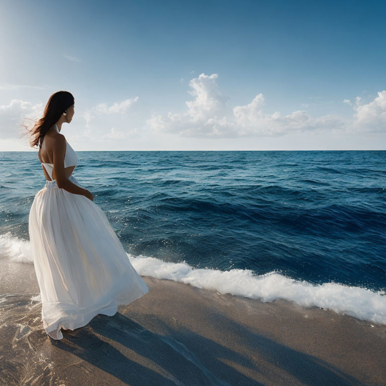 Woman in White Dress on Beach Looking at Sea Under Blue Sky